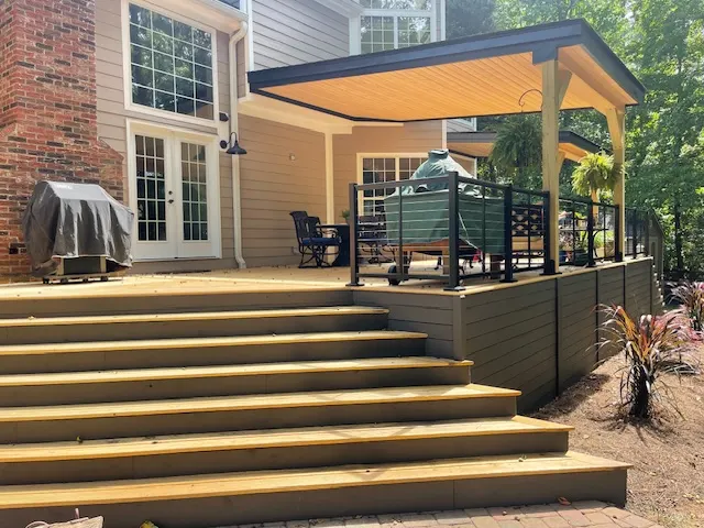 Covered deck with wide stairs