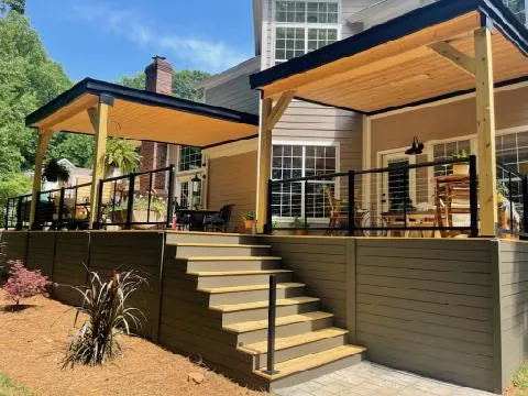 Covered deck with stairs and cable railing