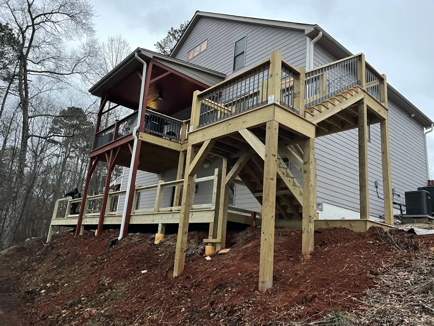 Multi-level deck framing during construction
