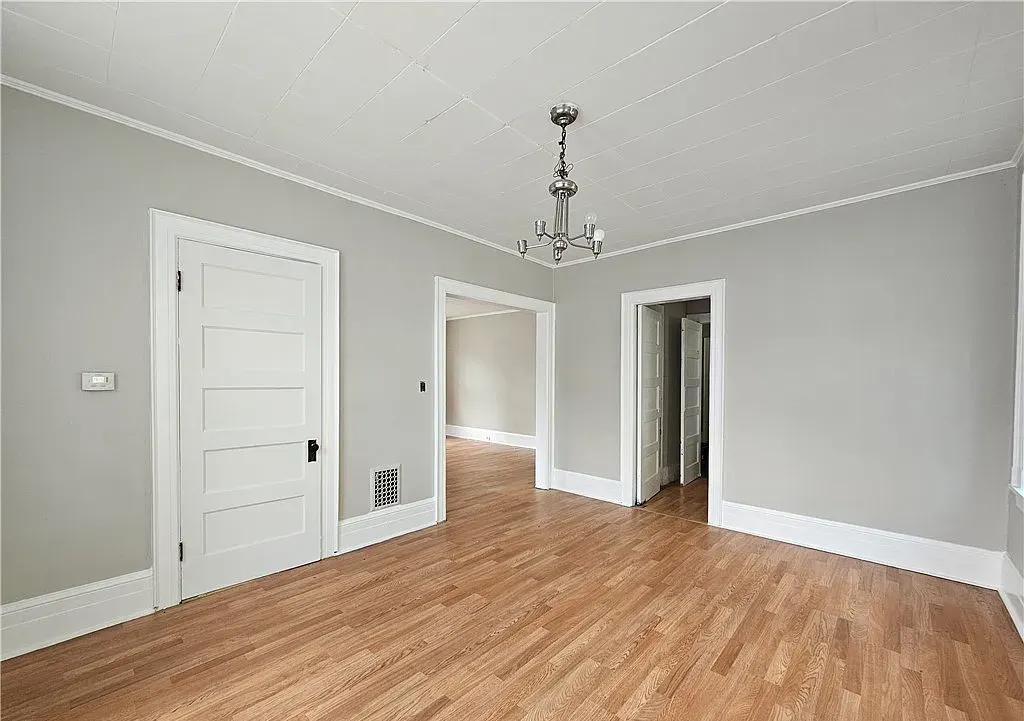Dining room with new floors and trim