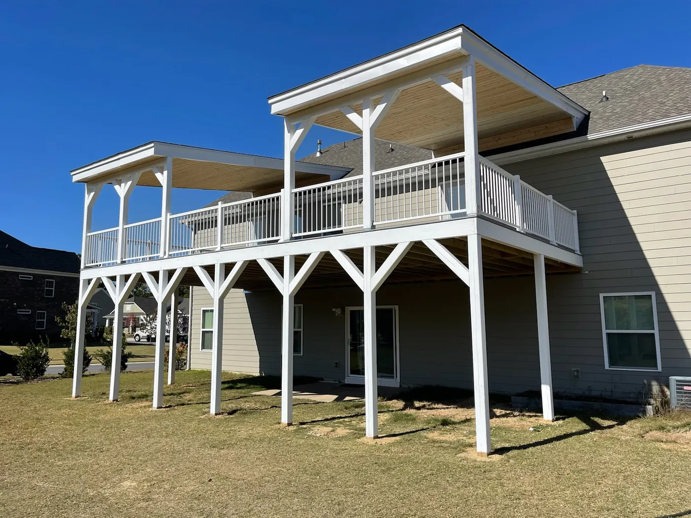 Double covered deck with white railings