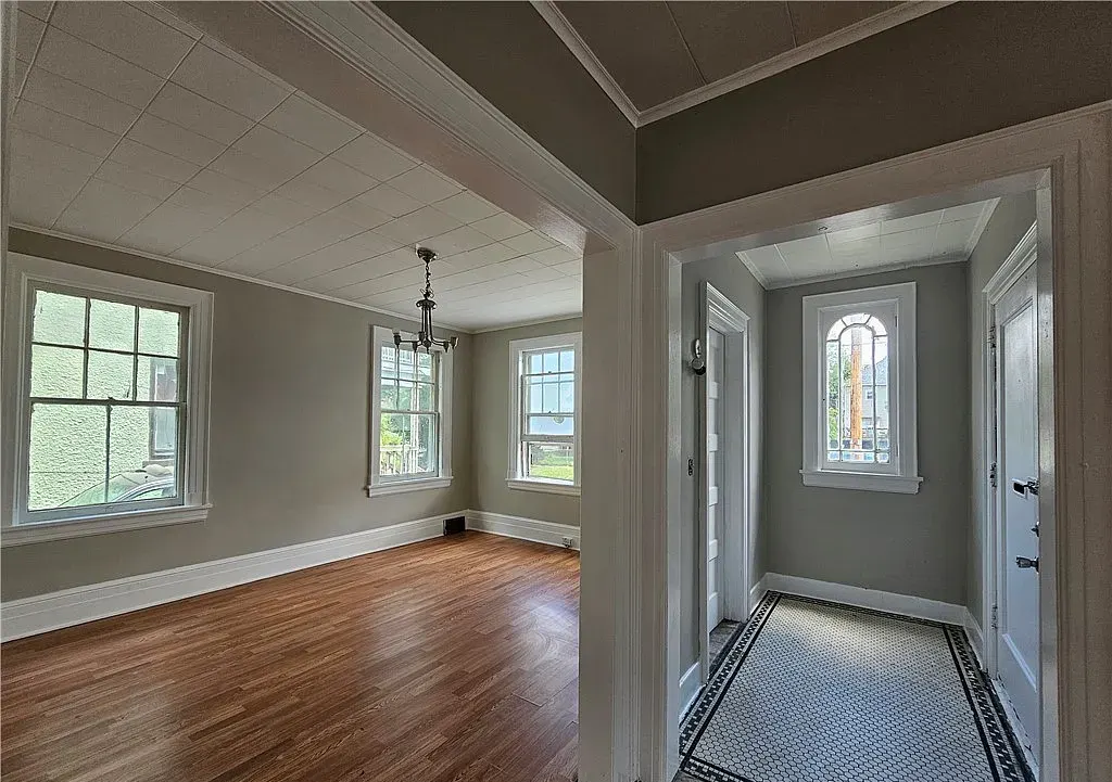 Living room opening to entry hall
