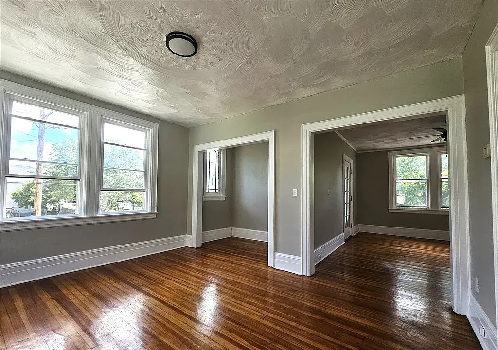 Living room with refinished hardwood floors